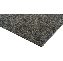 Detailopname van een tapijt.