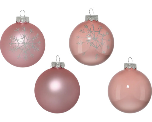 Vier roze kerstballen, sommige met sneeuwvlokpatroon