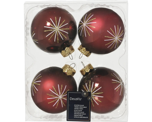 Vier glazen kerstballen met sterpatroon in verpakking