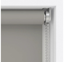 Detailopname van een rolgordijn met kettingbediening voor raamdecoratie