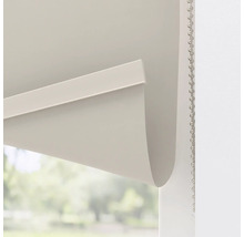 Detailopname van een grijs rolgordijn met kettingbediening