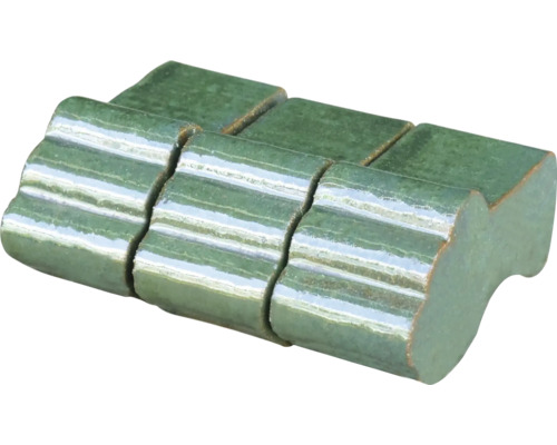 Groene keramische tegel met golvend oppervlak