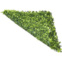 Kunstgrasmat met planten op kunststof raster