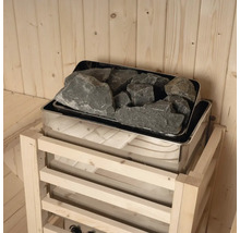 Saunakachel met saunastenen in een houten cabine