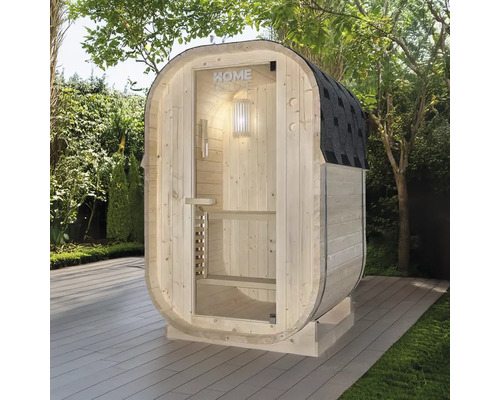 Houten sauna met glazen deur en dakleer in de tuin.