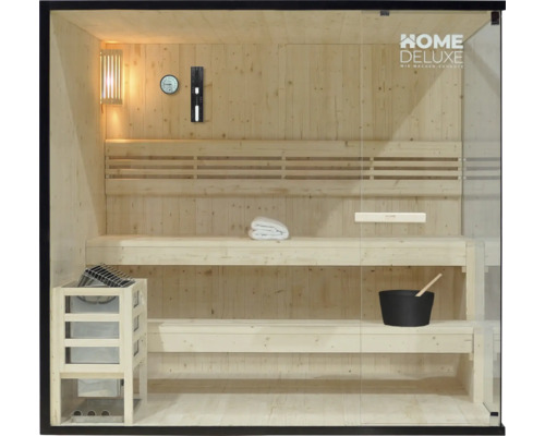 Interieur van een sauna met houten banken, kachel en glazen voorzijde