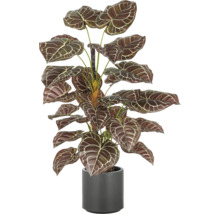 Kunstmatige kamerplant in pot met gemusterde bladeren.