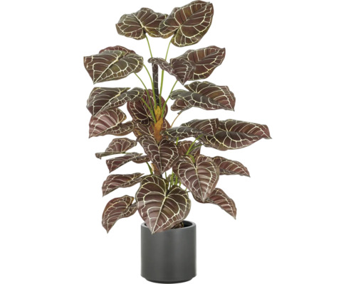 Kunstmatige kamerplant in pot met gemusterde bladeren.