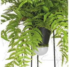 Kunstvaren in een pot op een metalen standaard