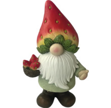 Tuinkabouter met aardbeienmuts en aardbeien in een mand