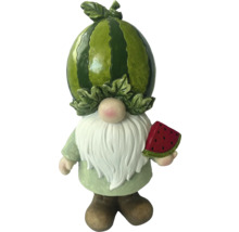 Tuinkabouter met watermeloen als hoofd en een meloen in de hand