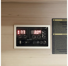 Bedieningspaneel van een sauna met digitaal display en veiligheidsinformatie