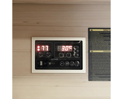 Bedieningspaneel van een sauna met digitaal display en veiligheidsinformatie