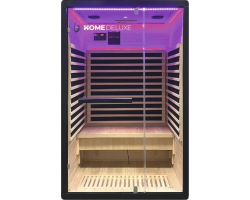 Interieurbeeld van een infraroodsauna met houten panelen, bank en glazen toegangsdeur