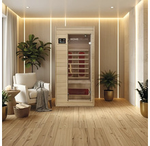 Infraroodsauna in een lichte, moderne ruimte met houten vloer en planten