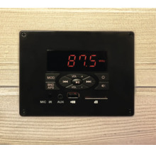 Zwarte audiomodule met display, knoppen en aansluitingen