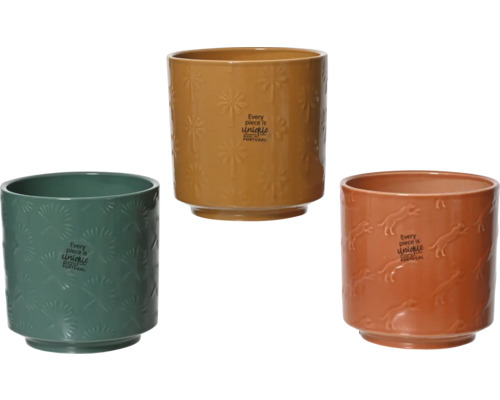 Drie keramische bloempotten met patronen