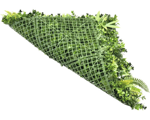 Kunsthaag met verschillende groene bladeren op kunststof rooster