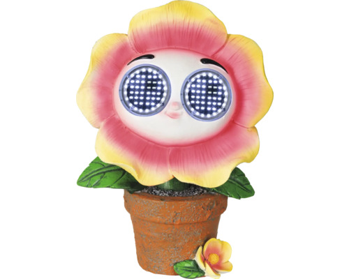 Bloem met solarlampen in een pot als tuindecoratie