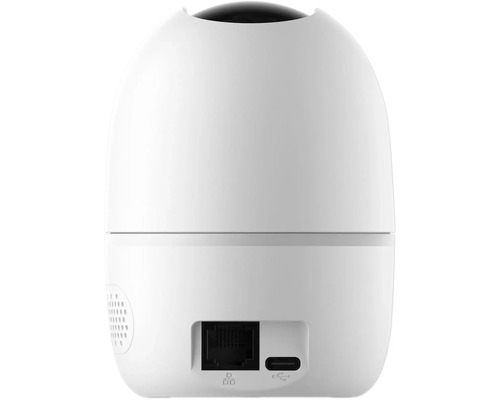 Achteraanzicht van een witte beveiligingscamera met aansluitingen