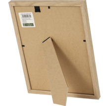 Achterkant van een licht houten fotolijst met standaard