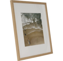 Fotolijst met passe-partout en een foto van strand en zee