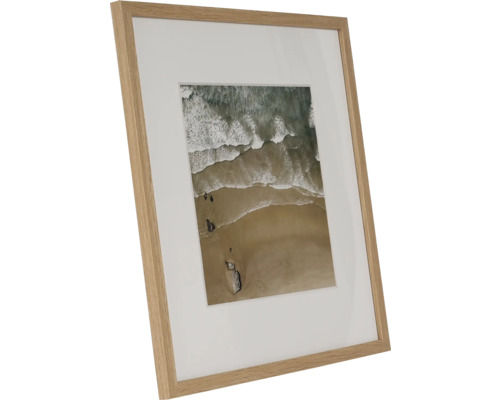 Fotolijst met passe-partout en een foto van strand en zee