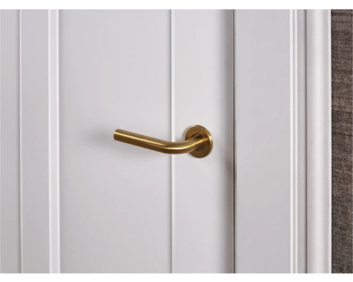 Deur met gouden deurklink