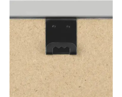 Detail van een fotolijstophanging aan de achterkant van een fotolijst