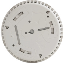 Onderkant van een rookmelder met bevestigingsmateriaal