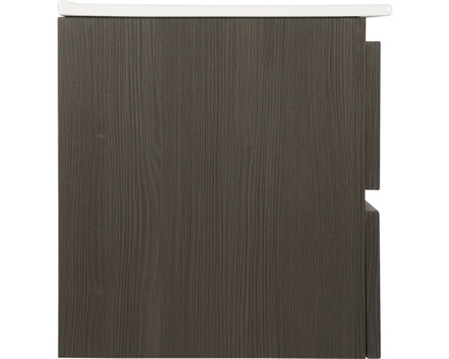 Detailopname van een wastafelonderkast met houten structuur