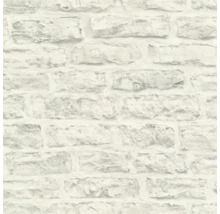 Close-up van een witte bakstenen behang met steenmotief.