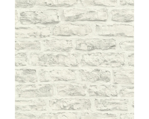 Close-up van een witte bakstenen behang met steenmotief.