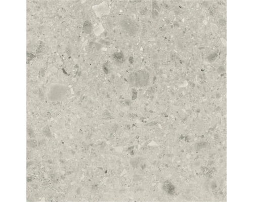 Close-up van een vloertegel met terrazzo-look