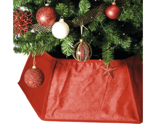 Versierde kerstboom met boomstandaardafdekking