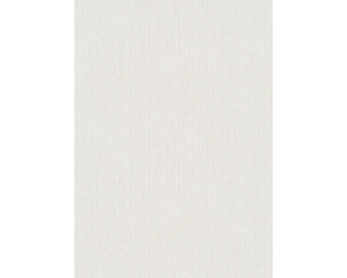 Close-up van een lichtgekleurd behang met fijne textuur