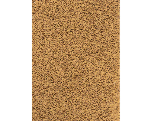 Close-up van bruin visvoer in de vorm van kleine, staafvormige pellets.