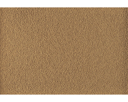 Detailopname van fijnkorrelige bruine meststofkorrels voor tuinonderhoud.