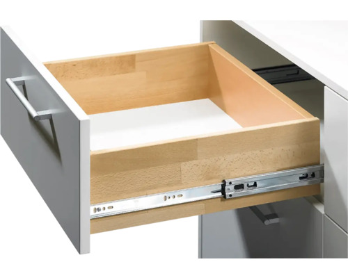 Open lade met metalen rail