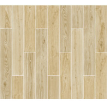 Tegels met houtlook, gelegd in een vloerbedekkingspatroon