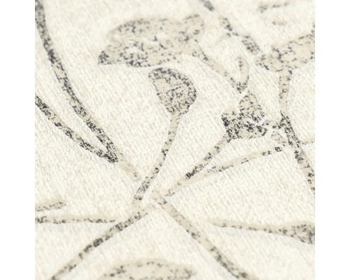 Vliesbehang met bloemmotief van takken en bloemen, gestructureerd oppervlak.