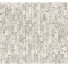 Vliesbehang met verticaal patroon van onregelmatige rechthoeken in steenlook met lichte textuur.