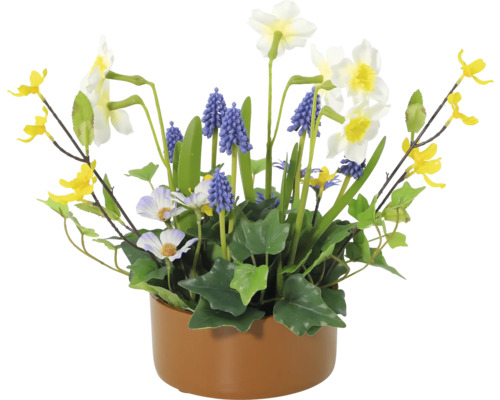 Bloemstuk met narcissen, blauwe druifjes en gele sierbloemen in pot