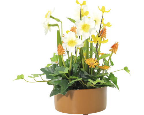 Kunstmatig bloemstuk met narcissen in een pot