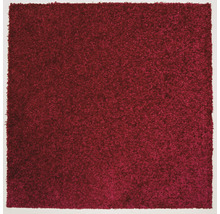 Detailopname van een rood tapijt met lusstructuur