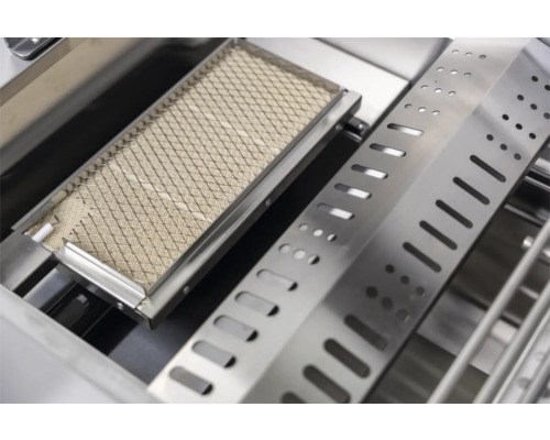 Detailopname van een metalen grillbrander