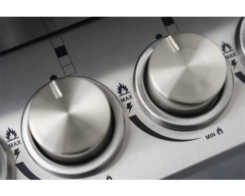 Close-up van draaiknoppen voor het bedienen van een barbecue