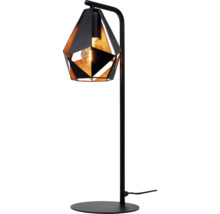 Decoratieve tafellamp met geometrische lampenkap en metalen voet.