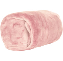 Opgerolde zachte fleece deken in het roze.