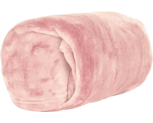 Opgerolde zachte fleece deken in het roze.